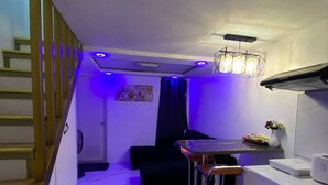 Unclassified image, 4 of 8, button - Golden Loft With Mood Lighting,stylish Staycation Loft Fast Wi-fi, Soft Couch (Pasay)