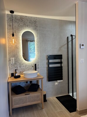 Shower, hair dryer, towels, soap