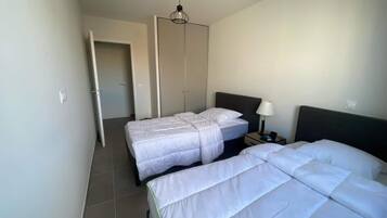 Apartemen | 2 kamar tidur, setrika/meja setrika, dan seprai linen