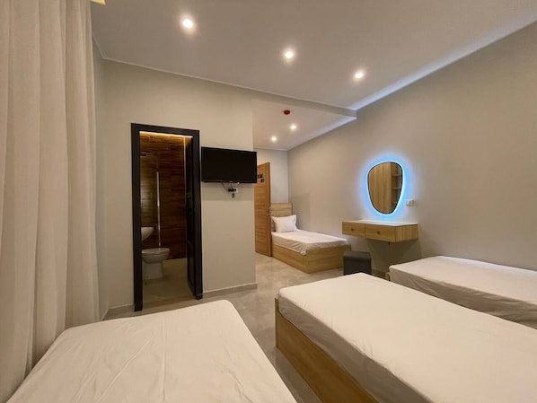 Family Quadruple Room, Multiple Beds, Private Bathroom | Egyptian cotton sheets, premium bedding, down duvets, pillow-top beds
