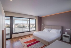 Apartment, Balcony, Garden View | In-room safe, iron/ironing board, free WiFi