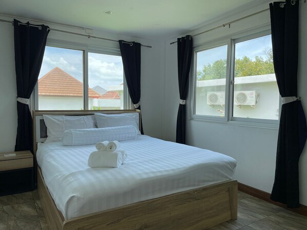 Rideaux d’obscurcissement, fer et planche à repasser