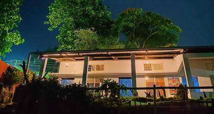 Aaira Farmstays-Garden with a pool.It has 2 cosy rooms,Art studio & nursery.