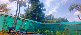 Aaira Farmstays-Garden with a pool.It has 2 cosy rooms,Art studio & nursery.