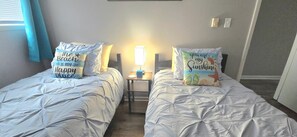 2 bedrooms, desk, iron/ironing board, travel crib