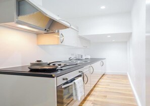 Microondas, placa de cocina