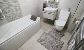 Hair dryer, bidet, towels, soap