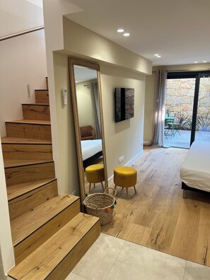 1 bedroom, desk, iron/ironing board, travel crib