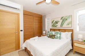 1 bedroom, desk, iron/ironing board, travel crib