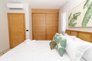 1 bedroom, desk, iron/ironing board, travel crib