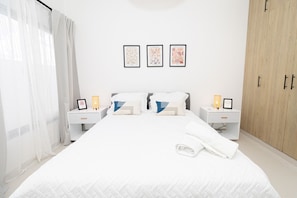1 bedroom, desk, iron/ironing board, travel cot