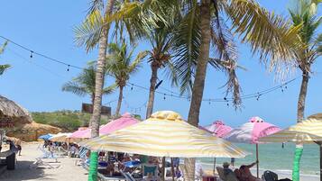 Sillas reclinables de playa, toallas de playa