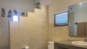 A bathroom with a toilet, a sink, and a mirror. - Brisa Marina - Studio Suite with Terrace (Corral del Risco)