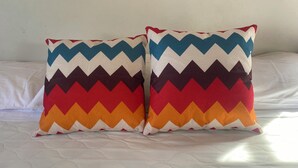 Two pillows with a zigzag pattern on a bed with a quilted cover. - Brisa Marina - Studio Suite with Terrace (Corral del Risco)