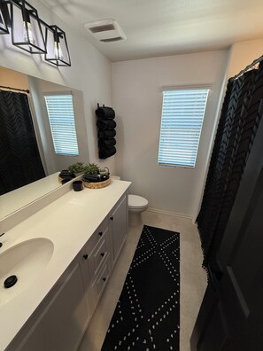 Hair dryer, towels, soap, shampoo