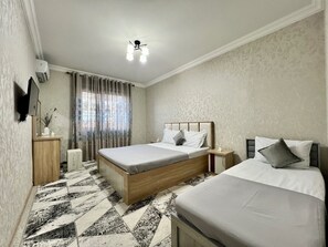 Blackout curtains, iron/ironing board, free WiFi