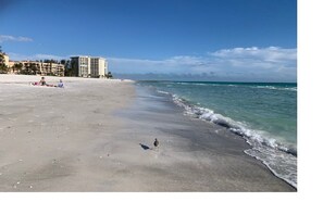 On the beach, sun-loungers, beach towels