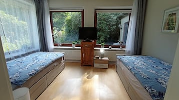 2 chambres, coffres-forts dans les chambres, fer et planche Ă  repasser