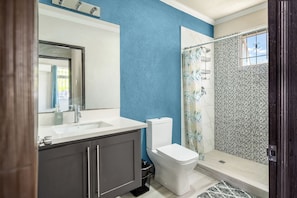 Shower, towels, soap, toilet paper