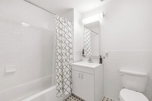 Hair dryer, towels, soap, toilet paper