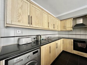 Fridge, oven, electric kettle, toaster