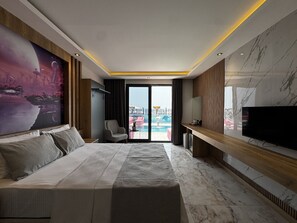 Deluxe Triple Room, Pool View | Desk, laptop workspace, free WiFi