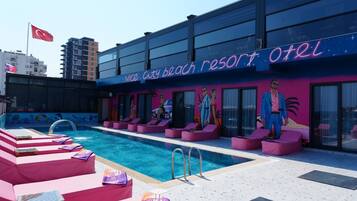 Deluxe Triple Room, Pool View | Desk, laptop workspace, free WiFi