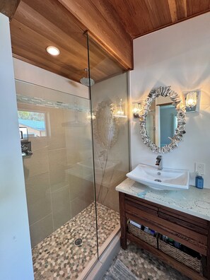 Shower, hair dryer, towels, soap