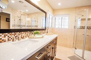 Shower, eco-friendly toiletries, hair dryer, towels