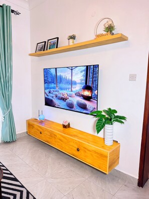 Comfort Apartment, 1 King Bed, City View | Living area - Kayz Haven Kololo 1BR Sereneville (Kampala)