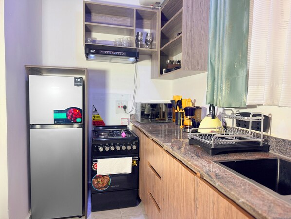 Comfort Apartment, City View | Private kitchen