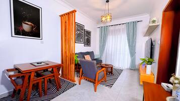 Comfort-íbúð - borgarsýn | Stofa