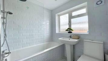 Eco-friendly toiletries, hair dryer, towels, soap
