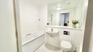 Hair dryer, towels, soap, toilet paper