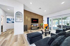 Smart TV, fireplace, video games, foosball
