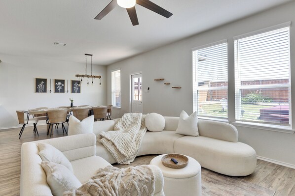 TV, fireplace - South Austin Luxe Boho House 4BR 2.5BA With SPA, Pool & EV Charger (Mustang Ridge)