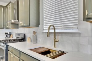 Microwave, oven, stovetop, dishwasher - South Austin Luxe Boho House 4BR 2.5BA With SPA, Pool & EV Charger (Mustang Ridge)