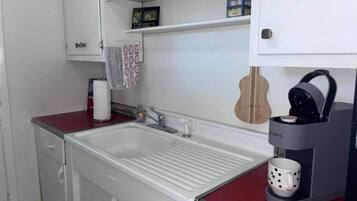 Fridge, microwave, cookware/dishes/utensils