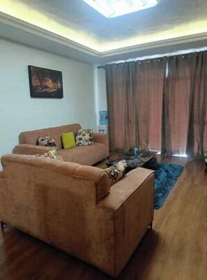 Living area - Stunninghome is near shopping mall
 And has a beautiful view (Nairobi)