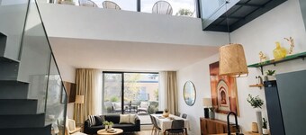 Stylish Two-Level Apartment with Private Rooftop Terrace – Downtown Montreal