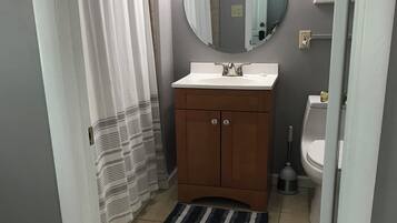 Hair dryer, towels, soap, toilet paper