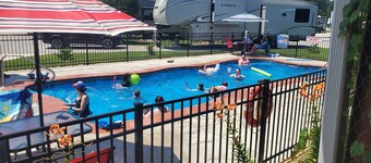 Enjoy cabin #64 at Heritage Acres Park with swimming, splash pad & more!