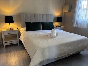 Familienapartment, Gartenblick | Zimmersafe, Schreibtisch, laptopgeeigneter Arbeitsplatz