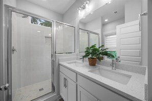 Shower, hair dryer, towels, soap