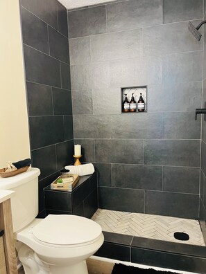 Shower, eco-friendly toiletries, hair dryer, bidet