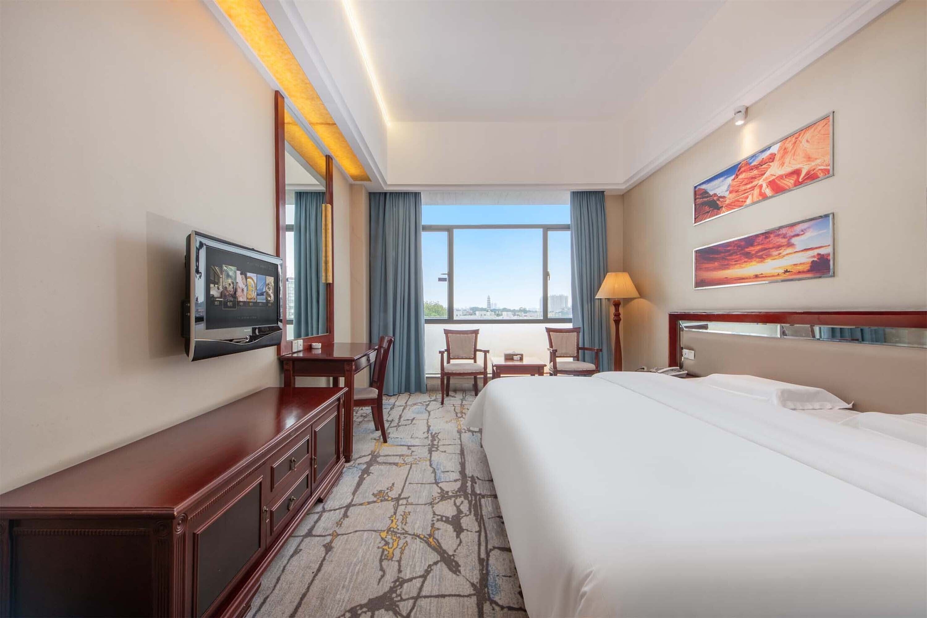 Minibar, desk, laptop workspace, blackout drapes