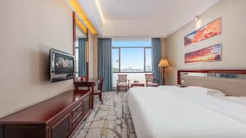 Minibar, desk, laptop workspace, blackout curtains