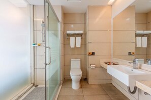 Standard Double Room, City View | Bathroom | Shower, free toiletries, hair dryer, slippers