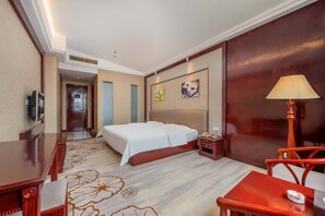 Luxury Double Room, City View | Minibar, desk, laptop workspace, blackout drapes