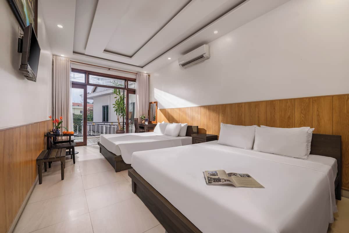 Family Studio Suite, Balcony, City View | Premium bedding, minibar, desk, laptop workspace